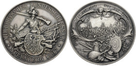 Nürnberg, Stadt. 
Medaille 1897 (von Balmberger) zum XII. Deutschen Bundesschießen in Nürnberg. Schütze mit Scheibe und Flinte hinter Adlerschild. Rv...