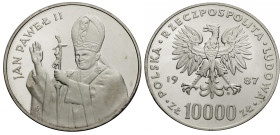 Polen, Königreich. 
VOLKSREPUBLIK, 1945-1989. 10000 Zloty 1987. Brustbild Papst Johannes Pauls II. segnend n. l. Rv. Adler. 35 mm; 19,3 g. KM&nbsp;16...