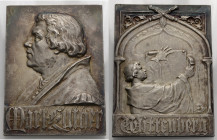 Thematische Medaillen. 
REFORMATION. Versilberte Bronzeplakette o. J. (um 1900, von Mayer). Brustbild Martin Luther n. l. Rv. Luther beim Anschlagen ...