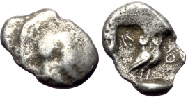 Attica, Athens AR Obol (Silver, 0.47g, 10mm) ca 353-294 BC. 
Obv: Helmeted head of Athena right
Rev: Owl standing right, head facing; olive sprig behi...