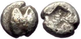 Lesbos, uncertain mint AR Tetartemorion (Silver, 0.23g, 5mm) ca 450 BC.
Obv: Two eyes (or grains?)
Rev: Irregular incuse square punch.The obverse type...