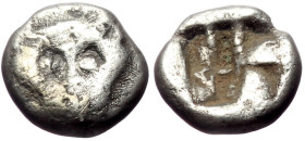 Lesbos, Uncertain mint AR Obol (Silver, 0.58g, 7mm) ca 500-450 BC.
Obv: Confronted boar's heads 
Rev: Quadripartite incuse square.
Ref: Klein 349.