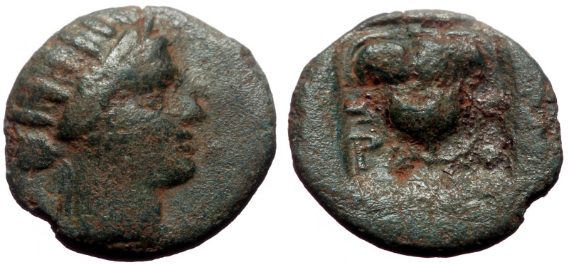 Islands off Caria, Rhodos AE (Bronze, 1.05g, 13mm) ca 188-84 BC. 
Obv: Radiate h...