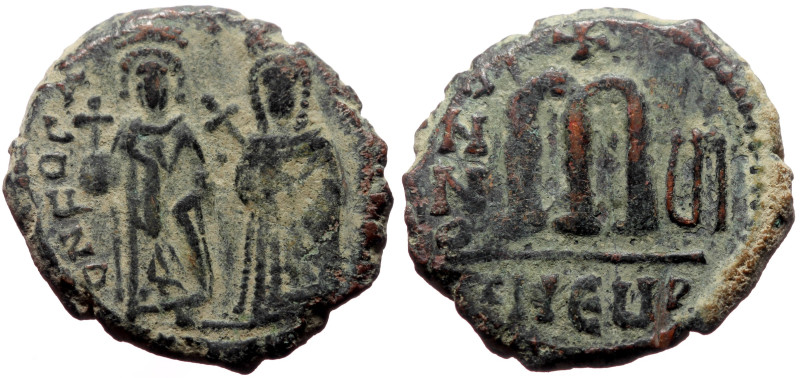 Phocas and Leontia (602-610) AE Follis (Bronze, 9.48g, 27mm) Antioch, 602-610 
O...