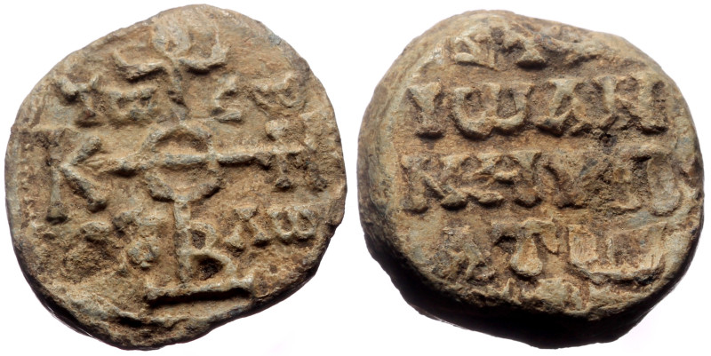 John hypatos (eighth century) Pb seal (8.38g, 17mm)
Obverse: Cruciform invocati...