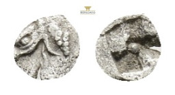 IONIA. Phokaia. Obol (Circa 521-478 BC). 0,21 g. 6,5 mm.
Obv: Head of griffin left.
Rev: Quadripartite incuse punch.