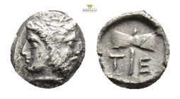 ISLANDS OFF TROAS, Tenedos. Circa 450-387 BC.Obol (Silver, 9,4 mm, 0.66 g,) Obv.Janiform head of Hera on the left and Zeus on the right. Rev. Τ-Ε Doub...