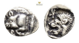 MYSIA. Kyzikos. Obol (Circa 450-400 BC). 0,82 g. 10,4 mm.
Obv: Forepart of boar left; to right, tunny upward.
Rev: Head of roaring lion left; star t...