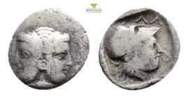 MYSIA. Lampsakos. Obol (Circa 500-450 BC). 1 g. 12,2 mm.
Obv: Janus-faced female head with diadem and earring.
Rev: Head of Athena within incuse squ...