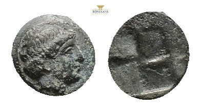 Greek coins AE 0,66 g. 9,1 mm. Bare head right, Quadripartite incuse square.