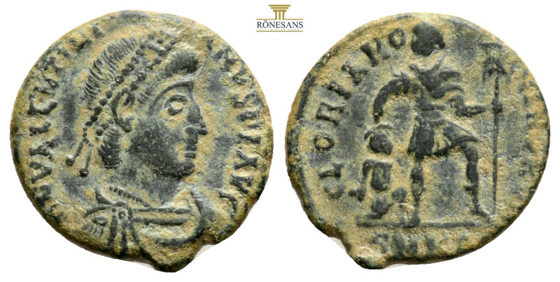 VALENTINIAN I (364-375). Ae. Sirmium. 2,6 g. 17,6 mm.
Obv: D N VALENTINIANVS P ...