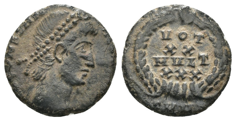 Constans. (347-348 AD). Æ Follis. (14mm, 1,36g) Antioch. Obv: D N CONSTANS P F A...