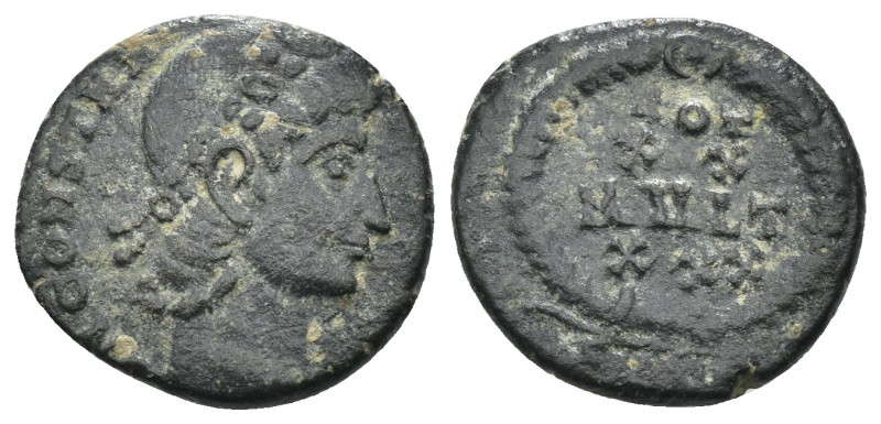 Constans. (347-348 AD). Æ Follis. Antioch. Obv: D N CONSTANS P F AVG. pearl-diad...