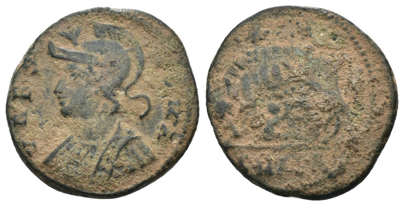 Constantinus I. (306-337 AD). Æ Follis. Antioch. Obv: VRBS ROMA. helmeted bust o...