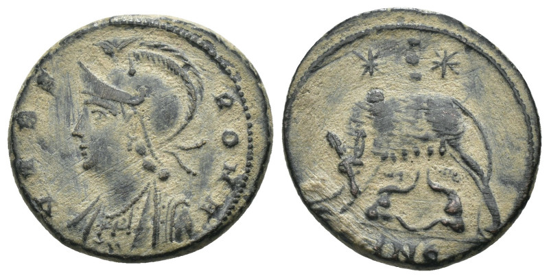 Constantinus I. (306-337 AD). Æ Follis. Antioch. Obv: VRBS ROMA. helmeted bust o...