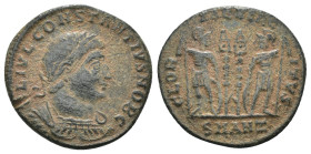 Constantinus I. (307-337 AD). Æ Follis. Antioch. Obv: CONSTANTINVS NOB C. diademed bust of Constantinus I. right. Rev: GLORIA EXERCITVS. two soldiers ...