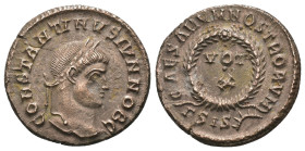 Constantinus I. (307-337 AD). Follis. Siscia. Obv: CONSTANTINVS AVG. laureate bust of Constantinus right. Rev: CAESARVM NOSTRORVM / VOT X. In wreath. ...