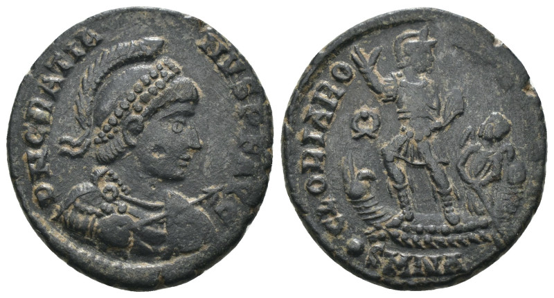 Gratian. (392-395 AD). Follis. Nicomedia. Obv: D N GRATIANVS P F AVG. helmeted a...