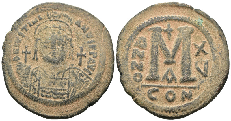 Justinian I. (527-565 AD) Æ Follis. Constantinople. Obv: crowned bust facing hol...