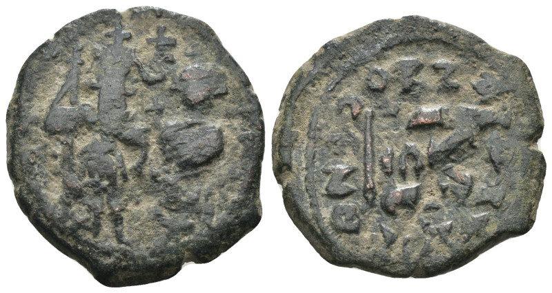 Phocas and Leonita. (602-610 AD) Æ Follis. Obv: Phocas and Leonita standing faci...