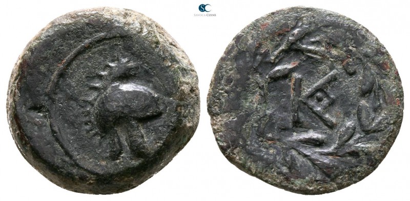 Sicily. Tauromenion 354-344 BC. 
Onkia Æ

13mm., 2,72g.



very fine