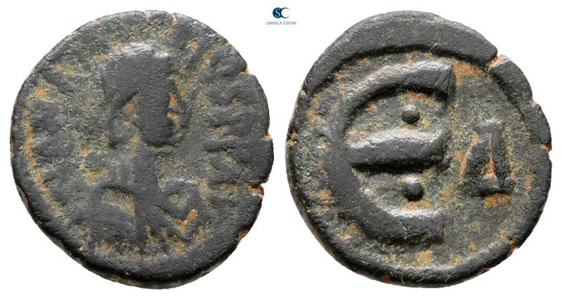 Anastasius I AD 491-518. Constantinople
Pentanummium Æ

15 mm, 1,85 g



...