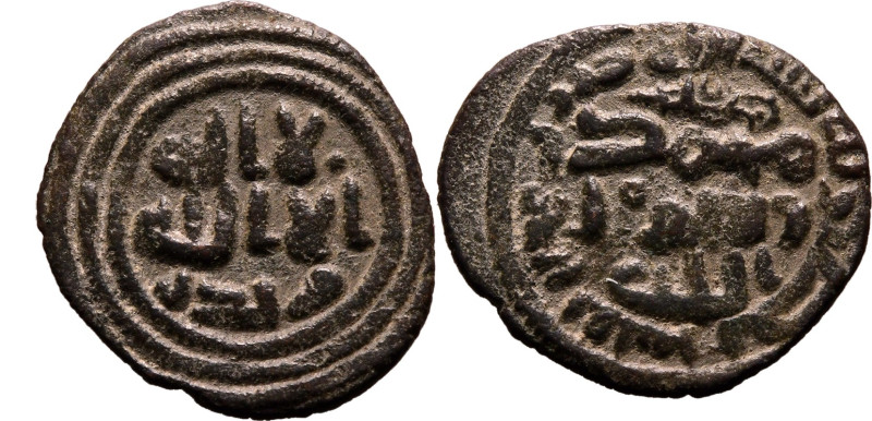 ISLAMIC. UMAYYAD CALIPHATE. 
Bronze fals, AH 77-132 = AD 692-697. Tabariya. 
U...