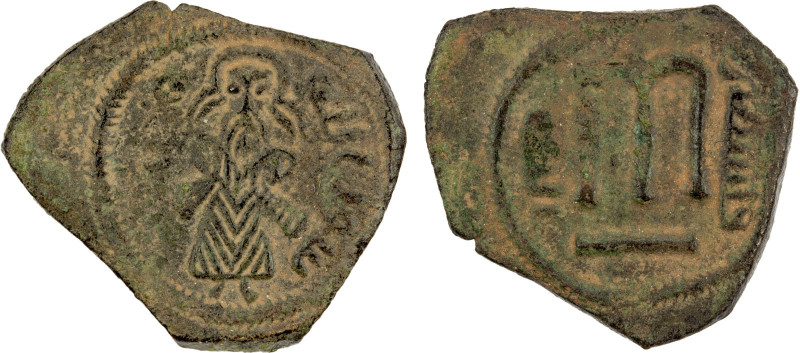 ARAB-BYZANTINE: Standing Caliph, ca. 692-705, AE fals (2.94g), Iliya (Jerusalem)...