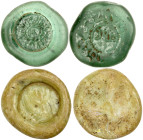 FATIMID: LOT of 2 glass jetons, including one of al-Hakim, 5.92g, translucent green, FGJ-154, with imam's name around central circle // kalima around ...