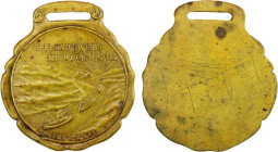 PANAMA: fob (20.15g), ND (ca. 1915), 39mm scalloped uniface brass fob for the Completion of the Panama Canal, canal with three ships advancing between...