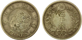 CHINESE CHOPMARKS: JAPAN: AR 50 sen, year 6 (1873), Y-25, Type I host coin, large Chinese merchant chopmark on reverse, toned, VF-EF, ex Howard A. Dan...
