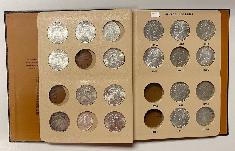 UNITED STATES: LOT of 27 Morgan Dollars, KM-110, in Dansco World Coin Library Al...