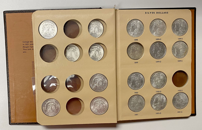 UNITED STATES: LOT of 26 Morgan Dollars, KM-110, in Dansco World Coin Library Al...