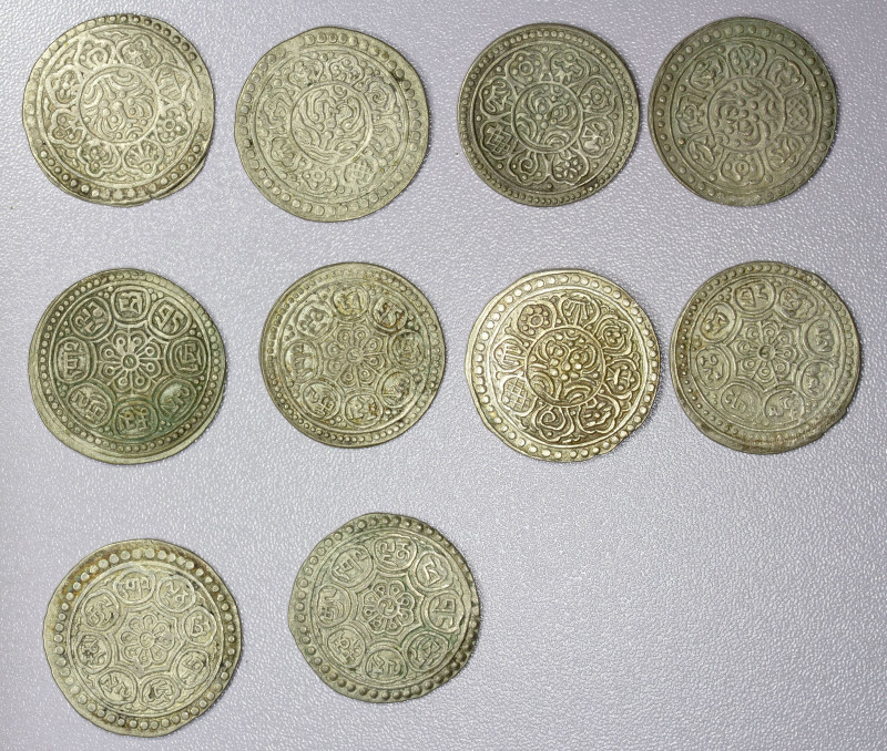 TIBET: LOT of 10 coins, silver ga-den tangkas, average circulated grades, retail...