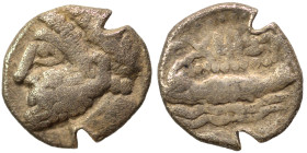 PHOENICIA. Arados. Uncertain king. Circa 400-384 BC. 1/16 Shekel (silver, 0.63 g, 9 mm). Laureate head of Ba'al-Arwad left. Rev. Galley right, above w...