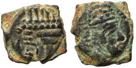 SASANIAN KINGS. Ae (bronze, 1.56 g, 13 mm). Bust right, wearing diadem and mural crown. Rev. Fire altar. Nearly very fine.