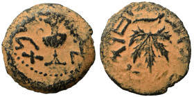 JUDAEA. First Jewish War, 66-70 AD. Prutah (bronze, 2.77 g, 16 mm). Amphora. Rev. Vine leaf on branch with tendril. Hendin 1360; Meshorer 196. Repatin...