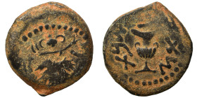 JUDAEA. First Jewish War, 66-70 AD. Prutah (bronze, 3.06 g, 18 mm). Amphora. Rev. Vine leaf on branch with tendril. Hendin 1360; Meshorer 196. Nearly ...