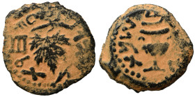 JUDAEA. First Jewish War, 66-70 AD. Prutah (bronze, 2.65 g, 17 mm). Amphora. Rev. Vine leaf on branch with tendril. Hendin 1360; Meshorer 196. Repatin...