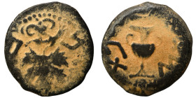 JUDAEA. First Jewish War, 66-70 AD. Prutah (bronze, 2.47 g, 16 mm). Amphora. Rev. Vine leaf on branch with tendril. Hendin 1360; Meshorer 196. Repatin...