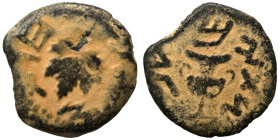JUDAEA. First Jewish War, 66-70 AD. Prutah (bronze, 2.27 g, 16 mm). Amphora. Rev. Vine leaf on branch with tendril. Hendin 1360; Meshorer 196. Repatin...