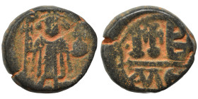 Constans II, 641-668. 12 Nummi (bronze, 8.49 g, 19 mm), Alexandria. Constans II standing facing, wearing crown surmounted by cross, holding long cross...