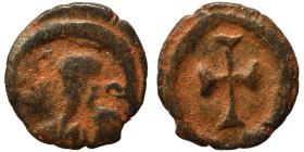 VANDALS. Uncertain. 5/6th century. Nummus (bronze, 0.35 g, 9 mm). Diademed head right. Rev. Cross within wreath. Nearly very fine.