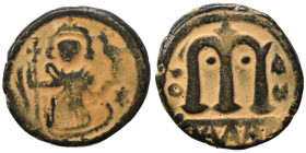 Arab Byzantine. Umayyad Caliphate, circa 641-660 AD. Fals (bronze, 3.86 g, 18 mm). Pseudo-Byzantine type, imitating the types of Constans II. Standing...