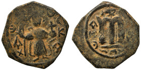 Arab Byzantine. Umayyad Caliphate, circa 641-660 AD. Fals (bronze, 3.57 g, 22 mm). Pseudo-Byzantine type, imitating the types of Constans II. Standing...