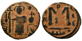 Arab Byzantine. Umayyad Caliphate, circa 641-660 AD. Fals (bronze, 4.04 g, 20 mm). Pseudo-Byzantine type, imitating the types of Constans II. Standing...