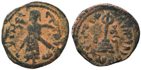 Umayyad Caliphate. al-Malik ibn Marwan, AH 65-86 / 685-705 AD. Fals (bronze, 3.01 g, 20 mm), 'Standing Caliph' type. Caliph standing facing, bearded, ...