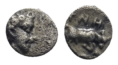 Ionia, Magnesia ad Maeandrum AR Tetartemorion. (6mm, 0.22 g) Circa 450-400 BC. H...