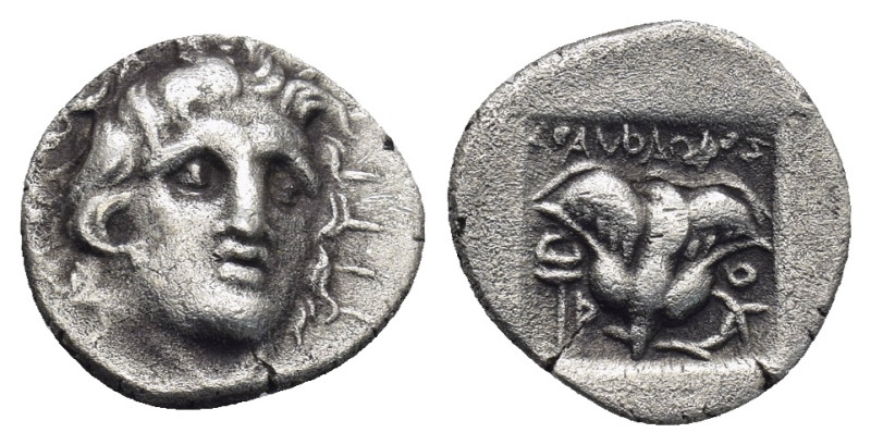 Caria, Rhodes. AR Hemidrachm Circa 170-150 BC. 1.44 Gr. 12mm.
Radiate head of He...