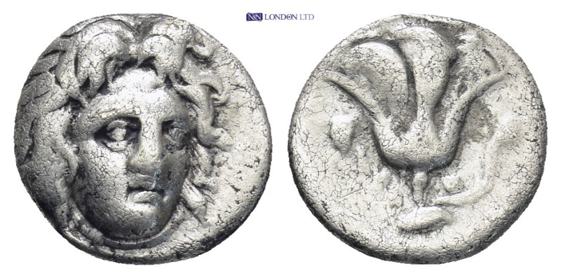 Rhodes . Circa 170-150 BC. AR Hemidrachm 1.55 Gr. 12mm.
Radiate head of Helios
R...